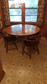 Round table &  Windsor spindle back arm chairs