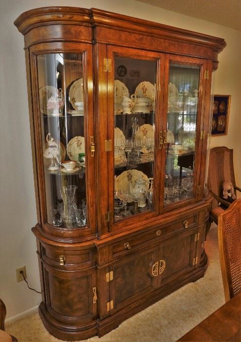 Curved glass lighted Hibriten china cabinet by Bernhardt