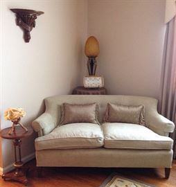 Newly covered love seat, small wood and brass stand, heavy wood matching sconces