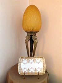 Unusual brass figurine base lamp with glass egg shade, beautiful when lit