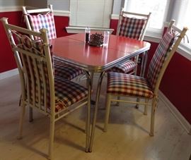 Retro kitchen table. Heavy iron chairs