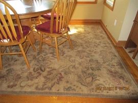Solid oak table, leaf and 6 chairs(6th chair not pictured here)