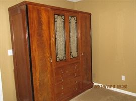 Antique English Wardrobe with trifold beveled edge mirror