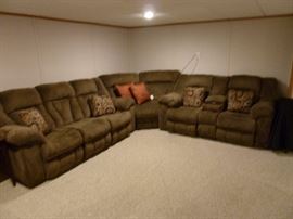 Ashley - Three piece sectional Sofa, loveseat and corner piece with four recliners!