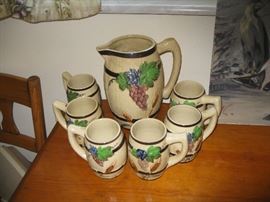 Vintage pitcher and 6 handled cups