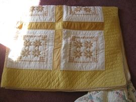 Embroidered gold quilt