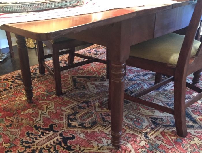 Walnut dining table and Oriental rug, 7'6"x10'10"