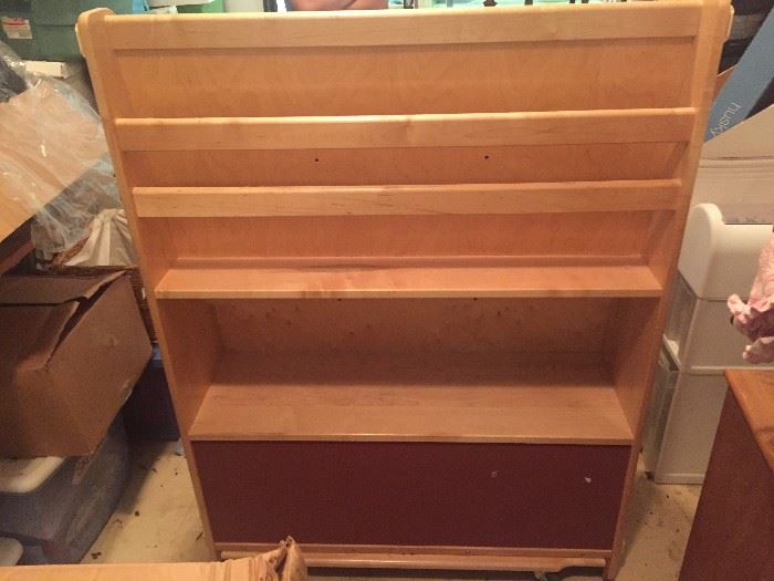 Children's Constructive Play-Things BookShelf.  Back Side. On Wheels. Excellent Quality and in New Condition. Wheels can snap shut as well.  Felt bottom and front photo is in the next photo. $225.00