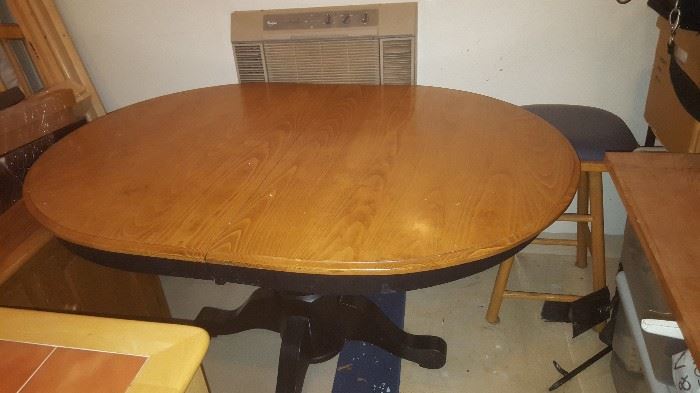 Solid Oak Table, Dark Walnut Base, 4 solid oak Chairs, seats 6 with leaf insert.  Priced at 450.00 Excellent condition. $385.00