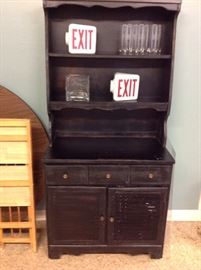 Painted wood hutch and vintage exit lights 