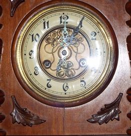 ANTIQUE GERMAN BLACK FOREST WALL CLOCK WITH BRONZE HORSE DETAIL AND DOGWOOD PATTERN