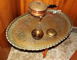 ANTIQUE TURKISH PIE CRUST EMBOSSED BRASS OVAL TABLE WITH FOLDING WOODEN BASE AND ASSORTED COPPER AND BRASS ITEMS