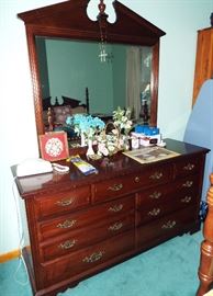 BROYHILL CHERRY FOUR POSTER WITH BROKEN PEDIMENT HEAD BOARD, DRESSER AND MIRROR, CHEST OF DRAWERS AND NIGHTSTAND