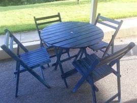 Mid-century wood table and four chairs