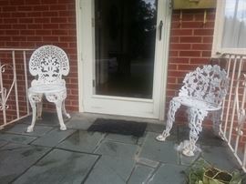 Two wrought iron Victorian chairs