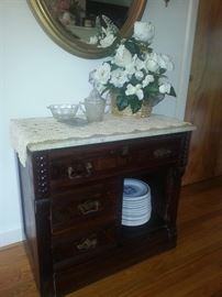 Antique wash stand  with marble top used as a small sideboard
