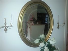 Vintage goldleaf oval mirror and pair of brass sconces