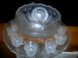 Gorgeous punch bowl with under plate, cups, and ladle