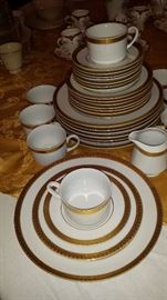 Gabbay Queen Victoria pattern 8-five pc. place settings + serving platter and round serving bowl.
