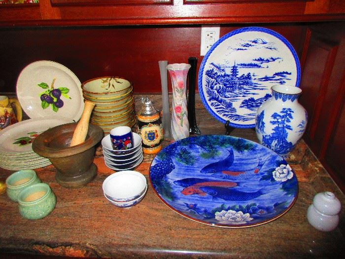 Various serve ware vases, platters & steins 