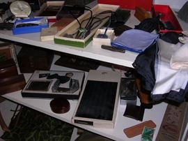 Partial Display of Men's Accessories. Lower shelf contains waders.