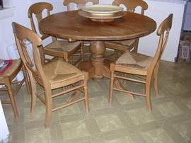Pine table with 6 chairs. Lazy Susan and large platter.