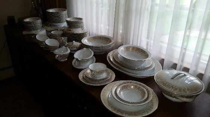 Noritake 12 place settings with serving pieces.  Replacement pieces too.