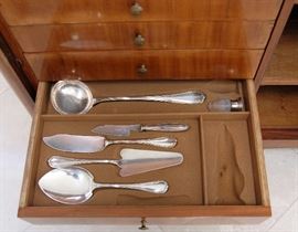 EARLY 20TH CENTURY FRENCH MADE CHINOISERIE CHEST FILLED WITH CHRISTOFLE SILVER PLATED FLATWARE AND SERVING PIECES IN THE RUBANS PATTERN