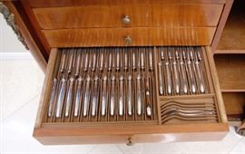 EARLY 20TH CENTURY FRENCH MADE CHINOISERIE CHEST FILLED WITH CHRISTOFLE SILVER PLATED FLATWARE AND SERVING PIECES IN THE RUBANS PATTERN