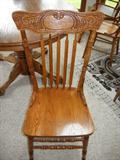 Four pressed back oak chairs (go with claw foot table)