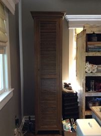 Set of two custom made tall cabinets. Can sell individually