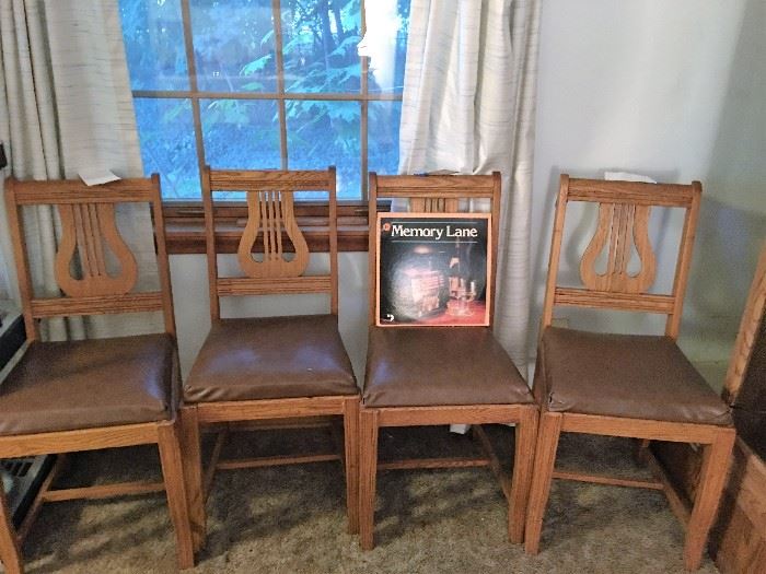 SET OF four  WOOD AND LEATHER CHAIRS 