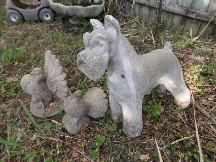 Concrete Dog and Peacock Statues