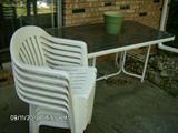 6-FT. GLASS-TOP PATIO TABLE W/ 6-STACKING CHAIRS