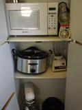 Westinghouse Microwave, Hamilton Beach Dutch Oven, Osterizer 12-speed blender, & Kitchen-Aid Mixer with stainless steel bowl, and assorted beater attachments.