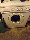 "Frigidaire" front load Washer / works well, some rust near lid seam.