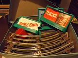 Lionel "O" gauge track, buildings, signs and other accessories (unfortunately no trains or rail-cars). 3-boxes