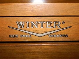 Inside of piano showing where made