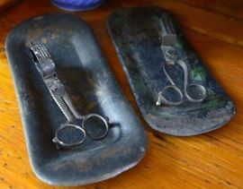 Collection of early Candle Snuffers and tole trays