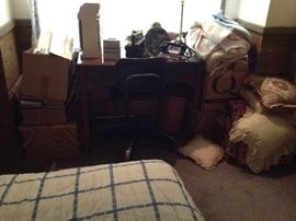 1940s industrial chair, Bed, Pillows, Antique Desk, lace