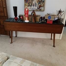 Very long vintage drop leaf table