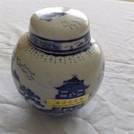 Small ginger jar filled with tea