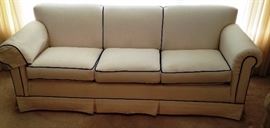 Upholstered sofa in black and white