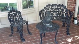 Wrought iron setee and chair with end table
