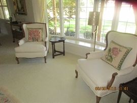 Gorgeous wingback chairs with wood accents