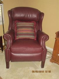 Leather wingback recliner with nail head accents