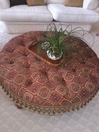 TUFTED OTTOMAN WITH TASSELS