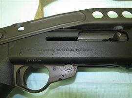 Franchi SPAS-12 12 gauge Shotgun, This one shoots semi auto or pump with fold out stock.