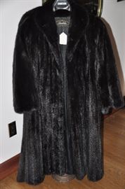 Spectacular Women' mink coat in pristine condition, size small. Also available, black mink size large