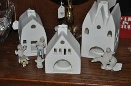 Miniature luminaries shown with antique snowbabies